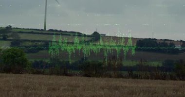 Ufukta beliren yeşil dalga formu enerji görselleştirmesi için türbin bıçaklarının dönmesini sağlıyor. Yenilenebilir, sürdürülebilirlik, çevre, teknoloji, manzara, hareket