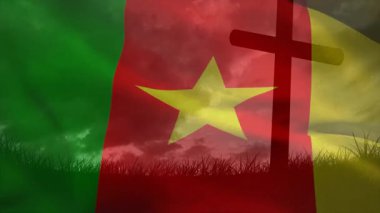 Başlangıçta Kamerun bayrağı açılıp bulutlu gökyüzünde dalgalanıyordu. Vatanseverlik, sembolizm, sinema, açık hava, atmosfer, ruhsal, dinamik