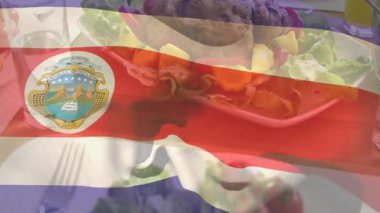 Şeffaf Kosta Rika bayrağı grafiği sola doğru süpürülüyor, salata milli gururunu gösteriyor. Yurtsever, ulusal, grafik, animasyon, konukseverlik, tazelik, mutfak