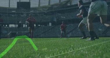 Top taşıyıcı koşu defans oyuncusunun ragbi analitik kaplamalarıyla mücadele ve kargaşa yaratmasına yol açtı. Atletizm, rekabet, spor, takım çalışması, açık hava, performans, adrenalin