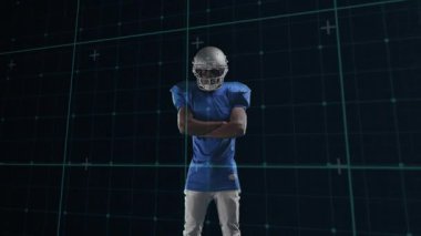 Futbolcu, spor tanıtımı için duraksadıktan sonra çaprazını değiştiriyor ve deniz mavisi kaplamasını işaret ediyor. Sporcu, strateji, dijital, fütüristik, endüstri, performans, motivasyon