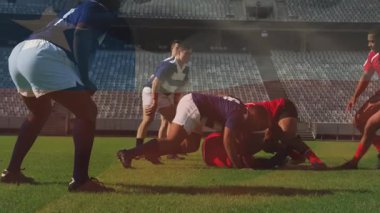 Rugby sahasındaki müdahaleyi takiben, kırmızı forvet topu taşıma ve pası sağlıyor. Atletik, rekabet, takım çalışması, yoğunluk, strateji, spor, açık hava