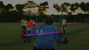 Orta kadın kaleci, şamdanlar evrim geçirirken saldırganın pasından sonra kurtarıcı vuruşu yapıyor. Atletik, takım çalışması, yoğunluk, strateji, görselleştirme, eğitim, rekabet