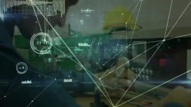 Teknisyen kontrol paneli ve sonda bağlantısı ve ölçümü sırasında animasyon grafiği gösteriyor. Elektronik, enstrümantasyon, ölçüm, laboratuvar, teknik, hassasiyet, mühendislik