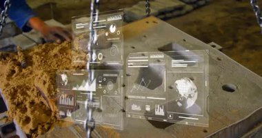 Zincirleme kaldırma, yeni başlatılan işçi kum kepçesiyle küf boşluklarına giriyor, gösterge paneli verileri gösteriyor. Sanayi, imalat, zanaat, teknoloji, mühendislik, kesinlik, çalışma alanı