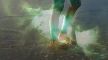 Dişi sporcu suya atlıyor giyilebilir sağlık teknolojisinde yeşil aura sallıyor. Fitness, zindelik, hareket, teknoloji, yenilik, doğa, sağlık