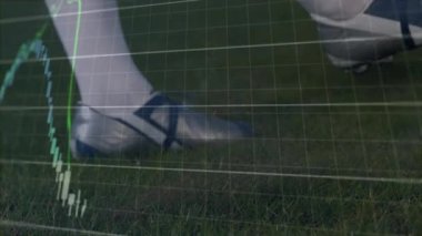 Finansal grafikler piyasa eğilimlerini görselleştirirken Cleat topa hafifçe vuruyor. Atletik, rekabetçi, dinamik, enerjik, analiz, strateji, açık hava