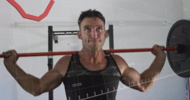 Asansör, spor salonundaki barın altında bir sonraki kaldırış için kalçalara baskı yapıyor. Veri grafiğiyle. Güç, fitness, egzersiz, eğitim, atletizm, disiplin, kararlılık