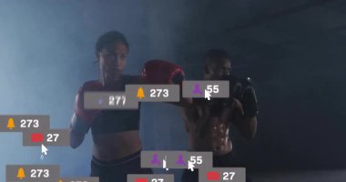 Kadın, yumruklarını yumrukluyor, adam spor salonunda yumruk atıyor, sosyal medyada hareketlilik yaratıyor, sayıları artıyor. Boks, fitness, antrenman, atletik, dayanıklılık, güç, dinamik