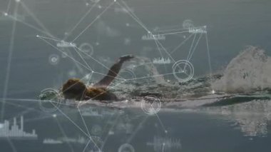 Yüzücü yüzüstü yüzerek suyun içinde hareketli düğümler eşliğinde yüzmeye başlıyor. Su, atletik, hareket, minimalizm, sağlık, dijital, dayanıklılık