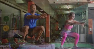 On coach signal man and woman performing matched box step-up squat-jumps in gym boosting fitness. Athletic, strength, fitness, training, dynamic, teamwork, energetic