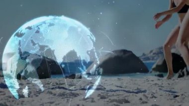 Sports tech with globe orbiting, two female players sprinting on beach to net for volleyball rally. Digital, athletic, vibrant, energetic, outdoor, competitive, futuristic