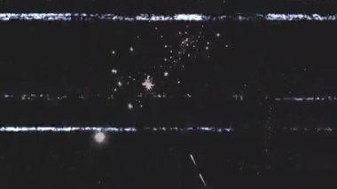 On glitch flicker appearing, firework shells launching and exploding over night sky for celebration. Spectacle, illumination, celebration, abstract, dynamic, vibrant, outdoor