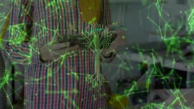Woman tapping tablet in tech lab upon pulsing circuit-tree graphic initiating digital simulation. Technology, innovation, futuristic, engineering, prototyping, digital, craftsmanship