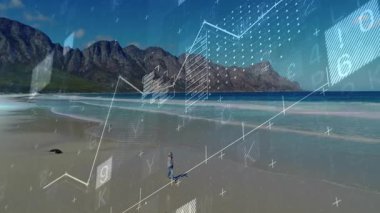 Tablolar kumlu sahilde yüzerken, kadın sol koruyucu gözlerle veriyi görselleştiriyor. Peyzaj, analiz, yenilik, fütürizm, açık hava, sükunet, keşif