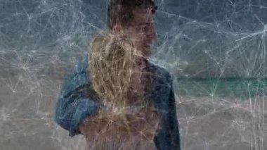 Sahilde okyanusa bakan bir çift, eğilen bir kadın, saç kaldıran bir meltem ve seyahat reklamı için sallanan bir gömlek. Romantizm, samimiyet, bağlantı, dinginlik, manzara, rahatlık, uyum.