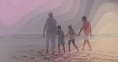 Aile gün batımında plajda el ele yürüyordu. Pastel rengi yükselen pazarlamayı başlatıyordu. Sahil şeridi, rahatlama, huzur, ortam, uyum, rahatlık, doğal