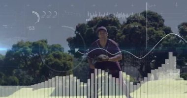 Beyzbolcu topa vuruyor, spor analitiği kaplamalarıyla topu yakalamak için dalıyor. Atletizm, spor, rekabet, eylem, açık hava, takım çalışması, kararlılık