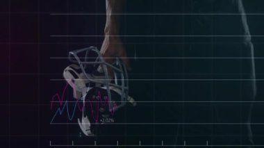 Erkek sporcu, spor analitiği animasyonunda kayarak kaskını kalça kalça kemiğine çeviriyor. Sporcu, spor, performans, veri, analiz, güç, fitness