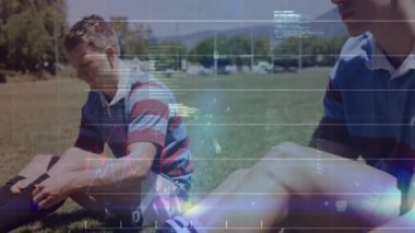 Sporcular bacak kaslarını sıkılaştırıyor ve spor sahasında HUD örtüşmesine yol açan veriler için giyilebilir mi diye kontrol ediyorlar. Spor giysileri, takım çalışması, yenilik, açık hava, fitness, teknoloji, eğlence