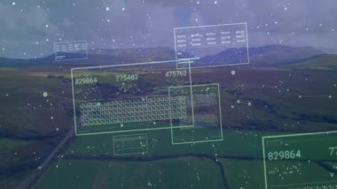 Beyaz parçacıklar, vadide ortaya çıkan ve çiftlik istatistiklerini güncelleyen veri panellerine doğru sürükleniyor. Teknoloji, veri görselleştirme, tarım, dijital arayüz, yenilik, analiz, çevre