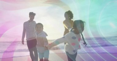 Aile elele tutuşuyor ve yürüyor. Sonra güneş ışığında plajda koşup mercek ışıkları olan sağlık reklamları için koşuyor. Macera, birlik, neşe, canlılık, açık hava, rahatlama, bağlantı