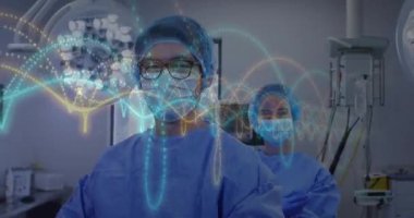 Cerrahi ekip ışığın altında duruyor. Dijital parçacıklar yaşam belirtilerini gösteriyor. Tıbbi, teknoloji, yenilik, sağlık, bilim, analiz, kesinlik