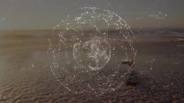 Dizide gün batımı sahili gösterilmeye başlandı, ağ küresi titreşimli olarak ortaya çıktı ve verileri gösterdi. Teknoloji, yenilik, fütürizm, dijital alarm, soyut, görselleştirme, ağ oluşturma