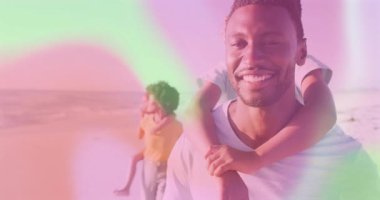 Scene opening showing travel family walking shoreline bonding overlaying pink green filter. Family, outdoor, lifestyle, serenity, bonding, leisure, horizon