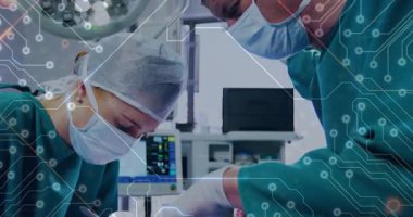 Tıbbi ekip kesme işlemini başlatıyor, titreşim devreli aletleri rehber dikiş ile birleştiriyor. Cerrahi, tıp, yenilik, teknoloji, sağlık, profesyonel, klinik