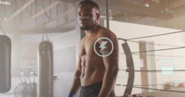 Boks salonunda kilo değiştirirken sağlık takibi yapan boksörlerin üzerinde ikonlar var. Zindelik, güç, çeviklik, eğitim, kararlılık, spor, canlılık