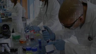 Lab scientists pressing pipette plunger and aspirating sample while pouring red reagent for assay. Science, research, experimentation, precision, innovation, laboratory, collaboration