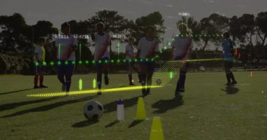 Coach signaling soccer team performing knee-lift warm-up drill, animated overlays tracking metrics. Athletes, fitness, training, sports, technology, performance, teamwork