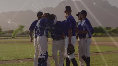 Sert vuruş vuruşlarından sonra beyzbol takımı oyun yeniden başlarken vuruş eldivenleri üzerinde bir araya toplandı. Takım arkadaşları, yoldaşlık, birlik, motivasyon, sportmenlik, koçluk, atletizm.