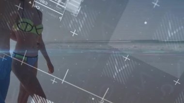 Sahile giren çift, para birimi eğilimlerini görselleştiren mali örtüşmeler gösteriyor. Sahil, kıyı şeridi, sükunet, veri görselleştirme, finansal tablolar, sahil kenarı, yaşam tarzı