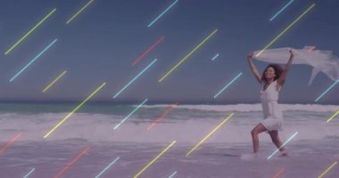 Gösterişten sonra, dansçı kıyı şeridinde koşar, moda gösterisi için eşarp sallar ve zıplar. Dalga, hareket, zarafet, dinginlik, özgürlük, tazelik, canlılık