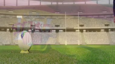 Crest grafikli titreşimli tetik, atlet ragbi vuruşunu başlangıç için direğe doğru yapıyor. Atletik, spor, eğitim, eylem, açık hava, rekabetçi, enerji