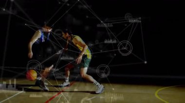 Top sürme sahtesini kullanarak 16 numaralı oyuncu potaya doğru dönüyor. Teknoloji smaç basıyor. Atletizm, rekabet, dinamik, hareket, spor, enerji, eğitim