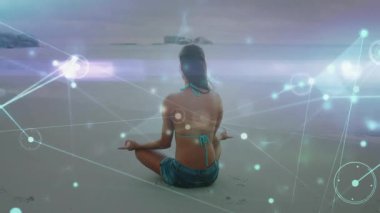 Kadın meditasyon yapıyor. Teknoloji ağı kuruyor. Hortum ve çizgilerle veri akışını görselleştiriyor. Meditasyon, farkındalık, bağlantı, dinginlik, teknoloji, dijital, rahatlama