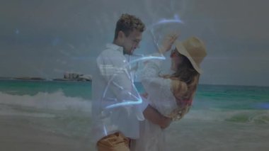 Sağlık için hastalık verilerini gösteren kıvrımlı DNA sarmalı ile tıbbi kaplamayı başlatan çift dansı. Romantizm, dijital alarm, sağlık teknolojisi, plaj, aşk, fütüristik, sağlık