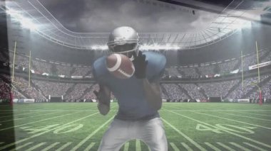 Yakalayıcı, kırmızı defans oyuncusu gibi görünen iki yardlık top paslarını yakalıyor. Sporcu, spor, aksiyon, açık hava, rekabetçi, adrenalin, dinamik