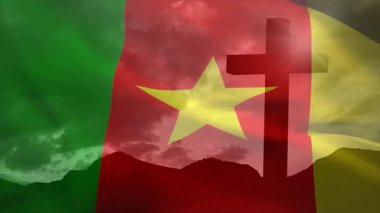 Kamerun bayrağı dağ siluetinin üzerinde kayboluyor, rüzgarla sürüklenen dalgalı yıldız ve haç. Vatanseverlik, milliyetçilik, manzara, semboller, miras, sükunet, doğal