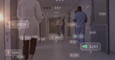 Doktor tıbbi koridorda yürüyor ve ikonlar yükseliyor. Doktorun elinde dosya ve hemşire yarışıyla koşmasını istiyorlar. Tıbbi personel, ekip çalışması, aciliyet, sağlık, dijital teknoloji, profesyonel çevre, dinamik hareket