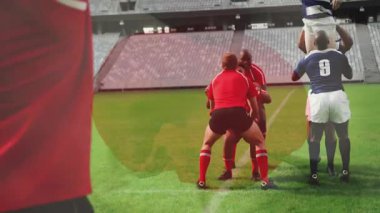 Kırmızı atıcı topu fırlatıyor, kırmızı ve donanma kaldırıcıları atlıyor, ragbi liginde top için yarışıyorlar. Spor, takım çalışması, rekabet, atletizm, stadyum, fiziksel, dinamik