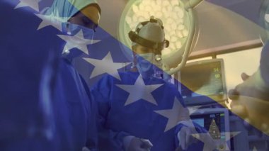 Bayrak kaplaması sürüklenme sırasında cerrahlar hayati belirtileri kontrol ederken pens değiştiriyor. Vatanseverlik, takım çalışması, sağlık, hassasiyet, esneklik, profesyonellik, tıp