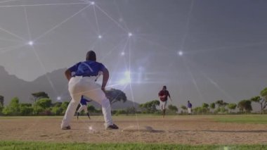 Beyzbol üçüncü kalecisi. Baserunner olarak hazırlanıyor, şebeke etiketini göstererek üsse kayıyor. Eylem, atletizm, spor, rekabet, dijital, dinamik, açık hava