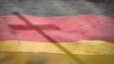 Rüzgar, Alman bayrağını dalgalandırırken uçak gölgesi hareket için çizgilerin üzerinde kayıyor. Vatanseverlik, milliyetçilik, açık hava, hareket, kumaş, dinamik, esinti