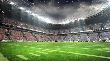 Konfeti tribünlerde kutlama yapmak için sahne ışıkları altında futbol sahasında sürüklenmeye başladı. Stadyum, kutlama, spor, zafer, atmosfer, enerjik, açık hava
