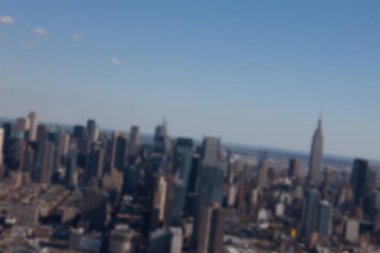 Blurry view of cityscape during summer