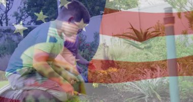 Eğitim bayrağı beliriyor, kardeşler yatağın yanında diz çöküyor, tohum ekiyor ve toprak topluyor. Doğa, bahçıvanlık, gençlik, açık hava, eğitim, aile içi, büyüme